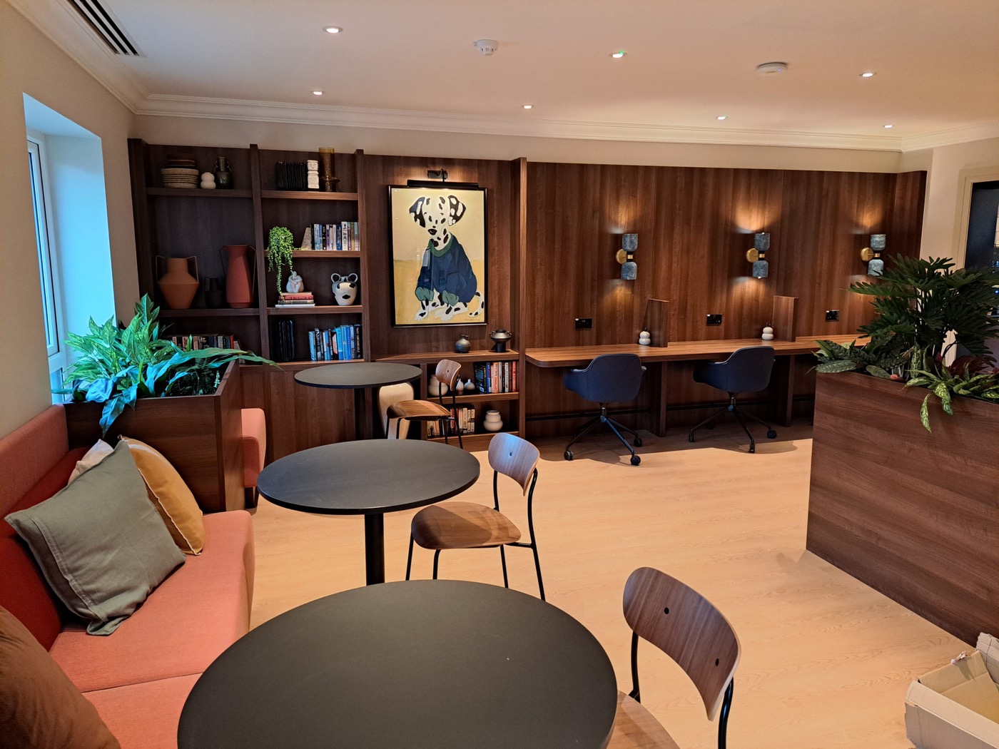 Pexhurst specialist refurbishment with timber-panelled lounge and workspace